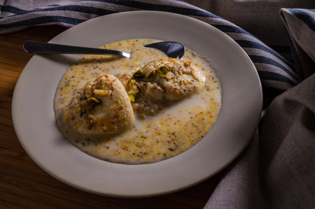 Indian Sweet Rasgulla Also Know as Rosogolla, Roshogolla, Rasagola, RasGulla, Anguri Rasgulla or Angoori Rasgulla is a Syrupy Dessert Popular in India.の写真素材