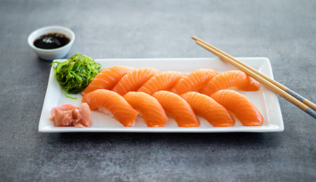 Fresh Sushi Roll with salmon, eel, tuna, avocado, royal prawn, cream cheese Philadelphia, caviar tobica, chuka. Sushi menu. Japanese food. Copyspace black background. Sushi menu.の写真素材