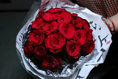 Bouquet of red roses on a black background. Bouquet of red roses.の写真素材