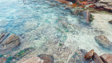 Beautiful beach in rio de janeiro brazil, with rocks and crystal clear water with rocks and sand...
