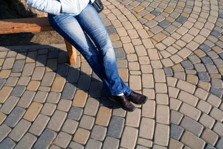 The girl on a benchの写真素材