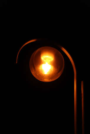 Street lighting luminaire in the street the night of settlement