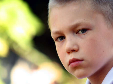 Portrait of the boy with a thoughtful sightの写真素材