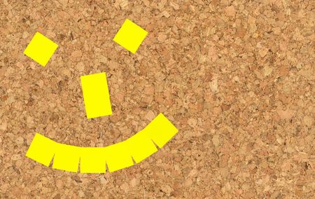 sticky notes on a noticeboardの写真素材