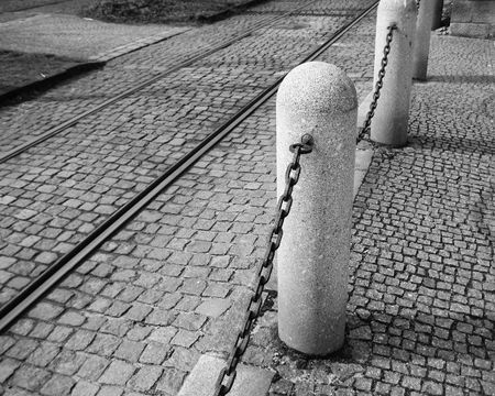 black and white tramlines with foot-stonesの写真素材