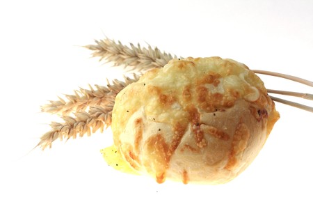 close up assortment of baked bread with cheeseの写真素材