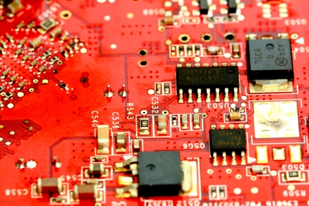 close up of a red printed circuit board