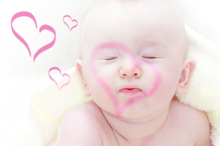 love  theme - child waiting for a kiss with heartsの写真素材