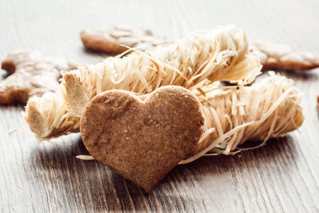 love cookies - gingerbread heart on wood table