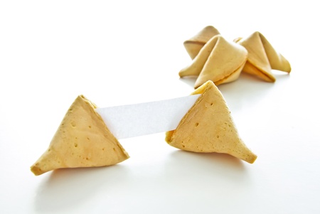 Asian fortune cookies with blank paper isolated on white background.の写真素材