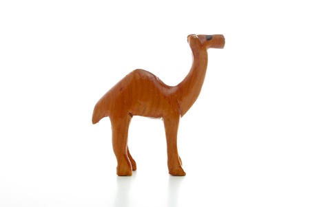 A wooden camels isolated on a white backgroundの写真素材