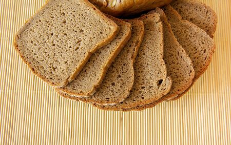 sliced bread on a bamboo background