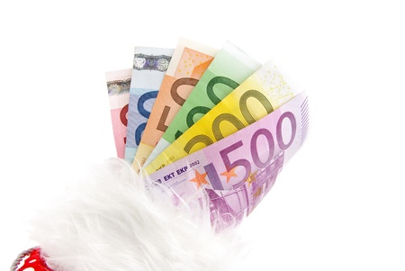 Fanned multicolored euro banknotes isolated on a white backgroundの写真素材