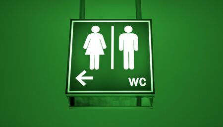 Men and women toilet sign with an arrow showing directionの写真素材