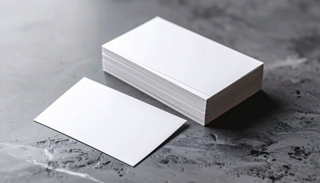 Blank business cards on grey background. Mockup for branding identity.の素材