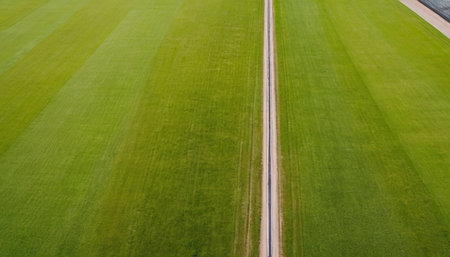 Coffee cup with latte art on wooden table in coffee shopの素材