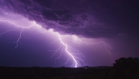 Lightning strike in the night sky. Thunderstorm, lightning strikeの素材