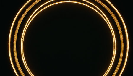 Circle of yellow neon lights on black background. 3d renderingの素材