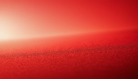 Red abstract background with bokeh defocused lights and shadow.の素材