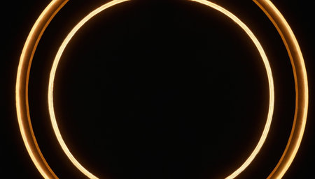Circle of yellow neon lights on a black background. 3d renderingの素材