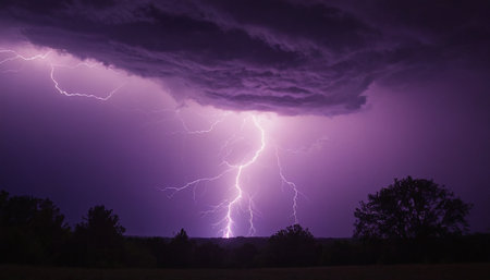 Thunderstorm with lightning in the night sky. Dramatic thunderstorm.の素材