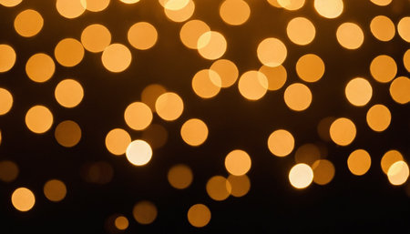 Abstract gold bokeh light on black background. Christmas background.の素材