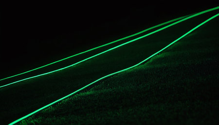 Neon light trails on the road. Long exposure photo taken in a tunnel.の素材