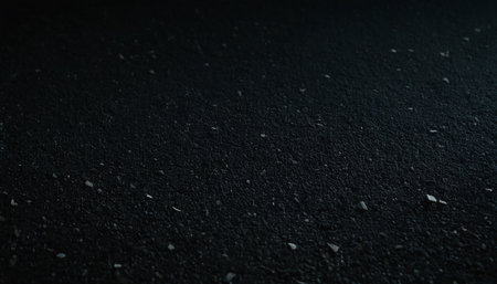 Black asphalt background. Texture of black asphalt. Dark asphalt background.の素材