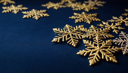 Golden snowflakes on a dark blue background. Christmas decoration.の素材