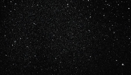 Snowfall on a black background. Snowflakes on a black backgroundの素材