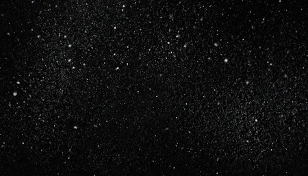 Snow on a black background. Snowflakes on a black backgroundの素材