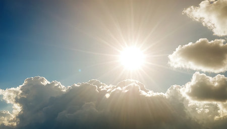 Sunny sky with clouds and sunbeams. Nature background.の素材