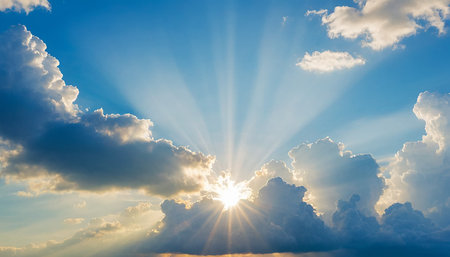 Sunset sky with clouds and rays of light. Nature background.の素材