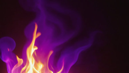 Fire flames in the dark, abstract background with copy space for textの素材