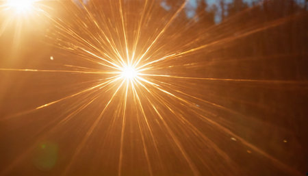 abstract background with sun burst and bokeh defocused lightsの素材
