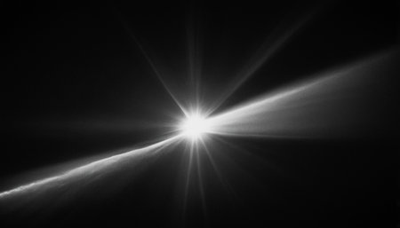 Abstract lens flare light effect. Sun burst with rays and spotlight.の素材