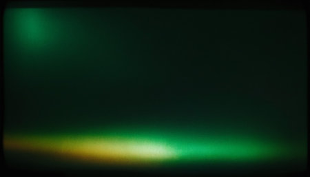 Green light on a black background with copy space for text or imageの素材