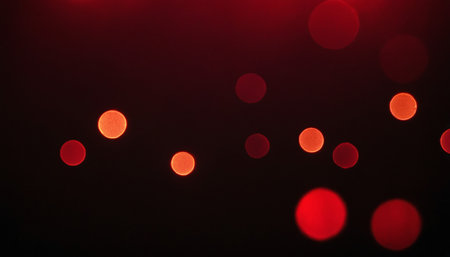 red bokeh background of christmas lights. abstract background.の素材