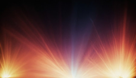 Colorful rays of light on a black background. Abstract background.の素材