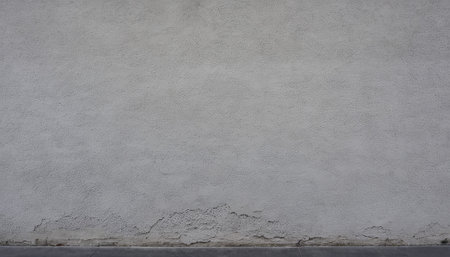 Texture of old rustic wall covered with gray stucco, backgroundの素材