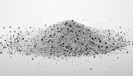 Pile of black powder isolated on white background. Pile of black powder.の素材