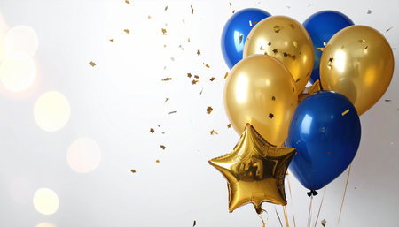 Golden and blue balloons with golden star and confetti on white backgroundの素材