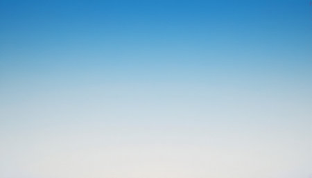 blue sky background, blue sky background. Blue sky background with tiny cloudsの素材