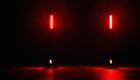 Two red led lamps on a dark background. 3D rendering.の素材
