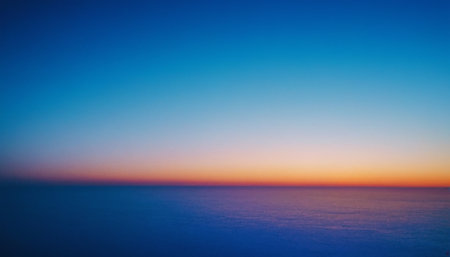 Beautiful sunset over the sea. Blue sky and sea. Backgroundの素材
