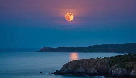 Full moon over the sea and rocks in the evening, Greece.の素材