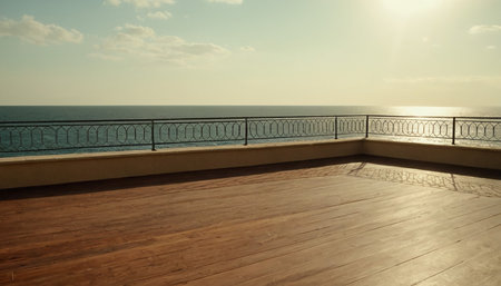 Wooden deck on the terrace overlooking the sea at sunset.の素材
