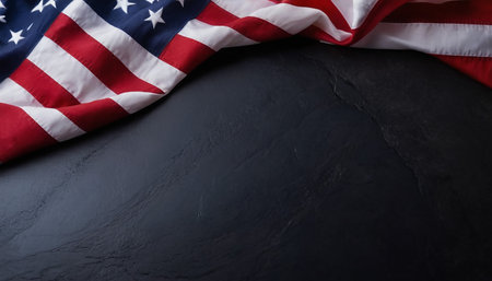 American flag on black stone background. Top view with copy space.の素材