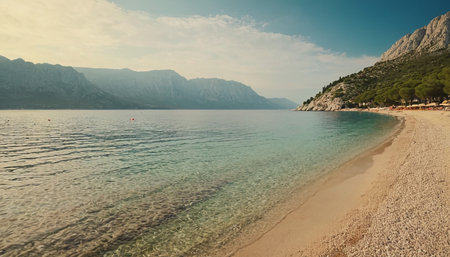 Beautiful beach with turquoise water and mountains in Montenegroの素材