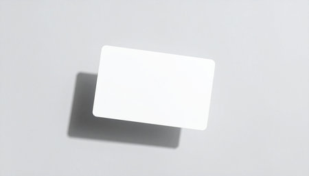 Blank business card mockup on white background. Top view.の素材